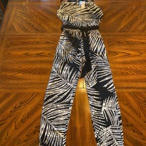 White House Black Market black and white palm print jumpsuit.